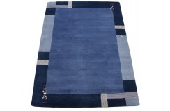 Z delikatnym obrzeżem dywan do salonu 100% wełniany Nepal tafting 170x240cm niebieski