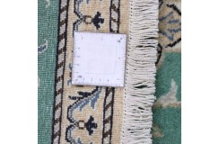 Ręcznie tkany dywan Nain 12lah kashmar z Iranu 90x140cm zielony
