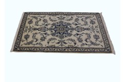 Ręcznie tkany dywan Nain z Iranu 90x145cm beżowy 