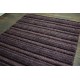 Markowy nietypowy dywan shaggy TOUAREG plum firmy Brinker Carpets piórka glamour 170x230cm masywny inny