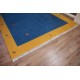 Stonowany wełniany dywan gabbeh 250x350cm 2cm gruby etniczny żółto niebieski