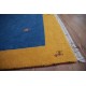 Stonowany wełniany dywan gabbeh 250x350cm 2cm gruby etniczny żółto niebieski