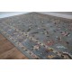 Szary dywan w kolorowe kwiaty z wełny owczej z Indii 155x245cm