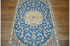 Ręcznie tkany dywan Nain 9la Habibian z Iranu 90x150cm niebieski