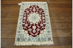 Ręcznie tkany dywan Nain 9la Habibian z Iranu 60x90cm czerwony